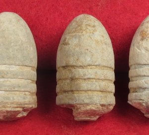Five .58 Cal. Type I Williams Cleaner Bullets with Partial Zinc Disks