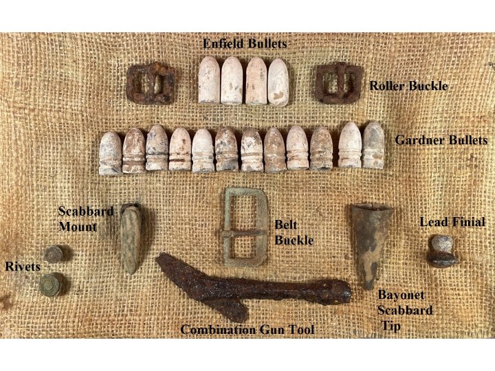 Display of Confederate Cartridge Box Contents and Parts, Belt Buckle, Gun Tool, and Bayonet Scabbard Hardware